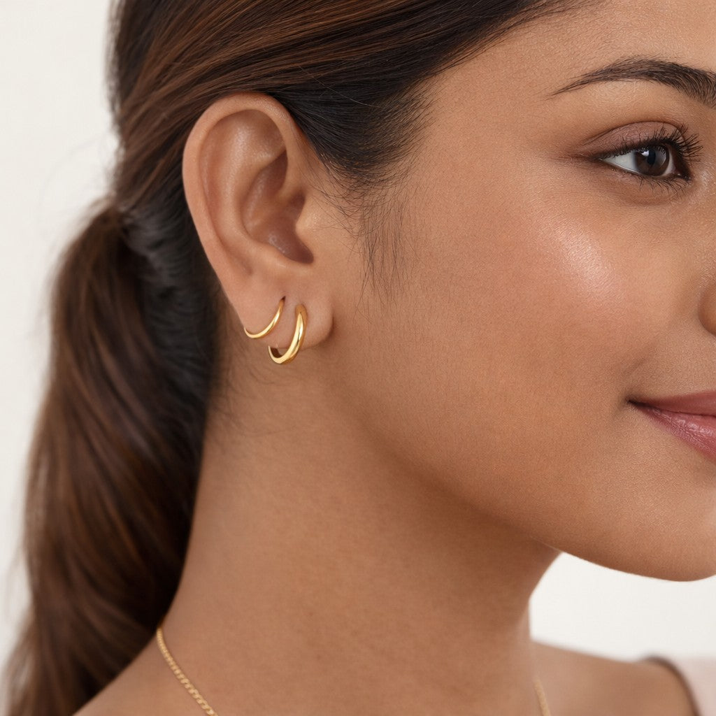 Double layer cord hoop earrings in gold tone stainless steel