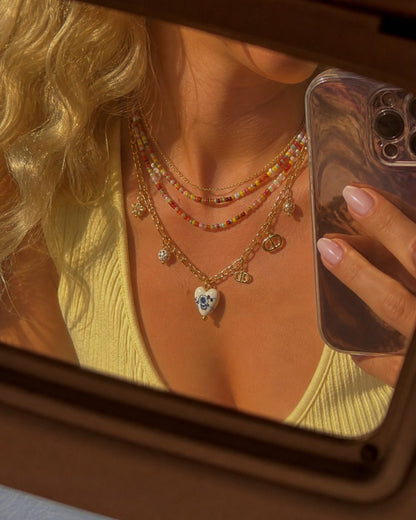 Trendy Gold Multi Charm Heart Necklace